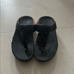 Authentic fit flops. Used condition.  See pictures.